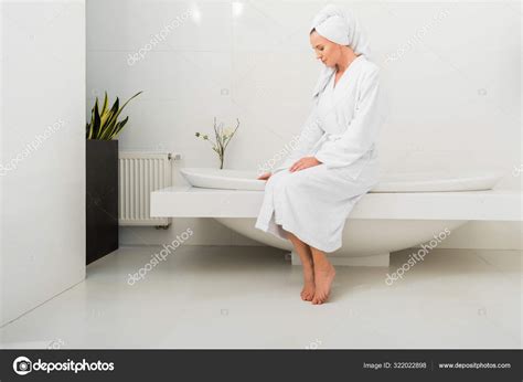 Beautiful Woman White Bathrobe Sitting Modern Bathroom — Stock Photo