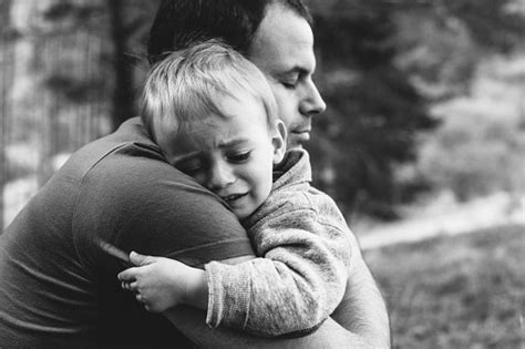 Father Hugging His Crying Son Stock Photo Download Image Now Istock