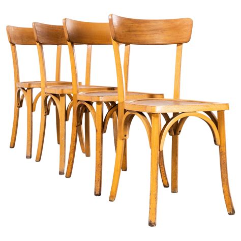 1950s French Baumann Blonde Round Leg Bentwood Dining Chairs Set Of Four For Sale At 1stdibs