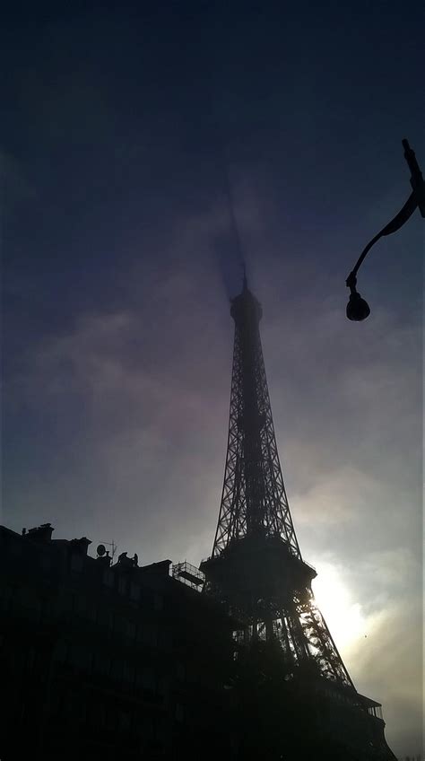 Itap Of The Eiffel Tower Shadow On The Dispersing Fog Ritookapicture