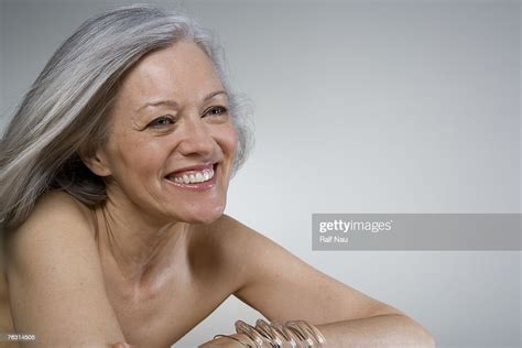 Mature Woman Smiling Closeup High Res Stock Photo Getty Images