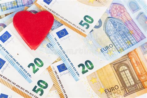 Red Heart With Euro Euro Banknotes Love And Money Stock Photo Image