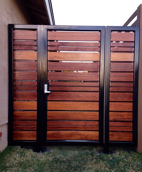Our estate ornamental privacy fencing lines combines wood pickets with a steel frame to create beautiful steel and wood privacy fence for your our estate ornamental privacy fencing line includes walk and drive gates to match the privacy fence style. Affinity Fence & Gate - 70 Photos - Fences & Gates ...