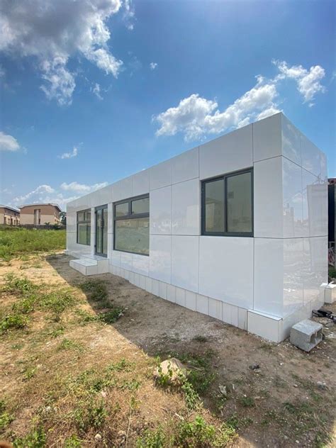 40ft Shipping Container Office Cladded In White Aluminium Composite