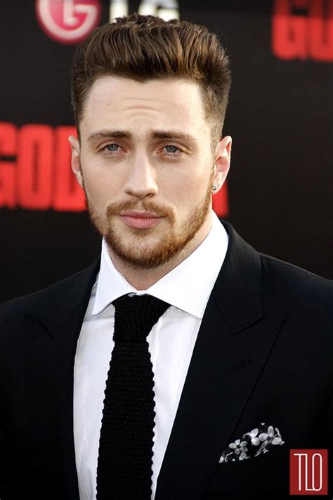 Decorative buckles at the sides. Aaron Taylor-Johnson and Sam Taylor-Wood at the "Godzilla ...
