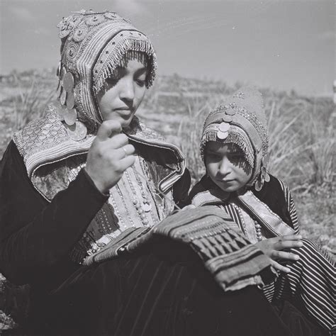 A Yemenite In Traditional Dress Embroidering A Garment 1947 Jewish