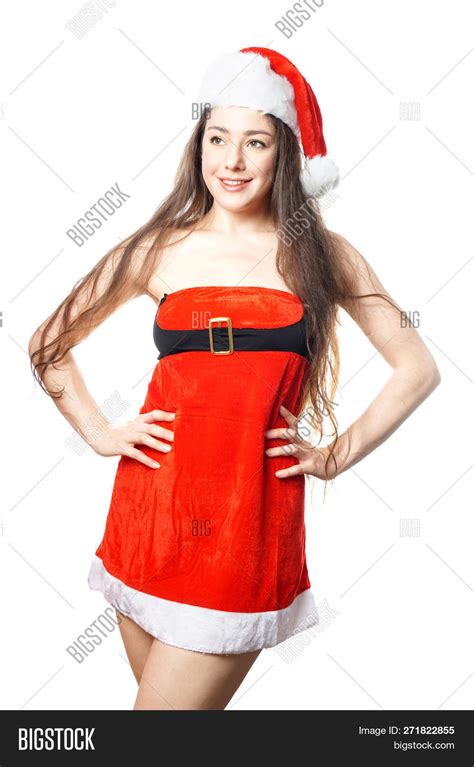 Beautiful Young Woman Dressed As Miss Santa Is Sexy