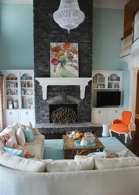 Light Blue Transitional Living Space With Charcoal Fireplace Cozy