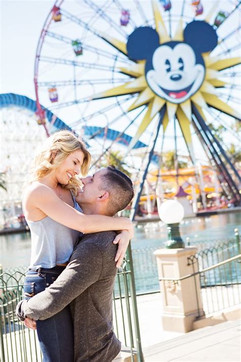 How Cute Are These Two Disneyland Lovebirds Disneyland Engagement