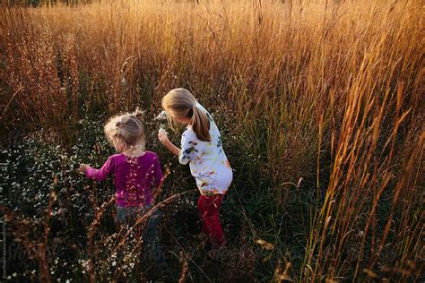 Sisters Exploring Nature By Stocksy Contributor Brian Powell Stocksy