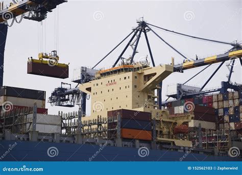 Container Ship Docked In Port Unloading Cargo Stock Image Image Of