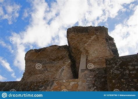 Two Big Stone Pieces Of Ancient Roman Building And Stone Wall Italica