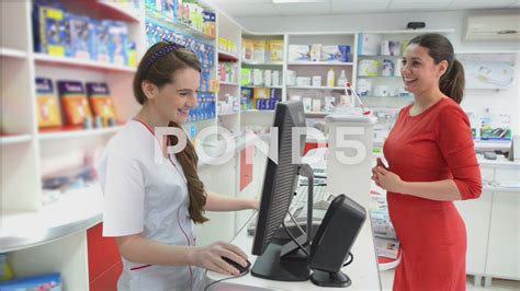 Young female pharmacist showing medical products Stock Footage,#pharmacist#showing#Young#female ...