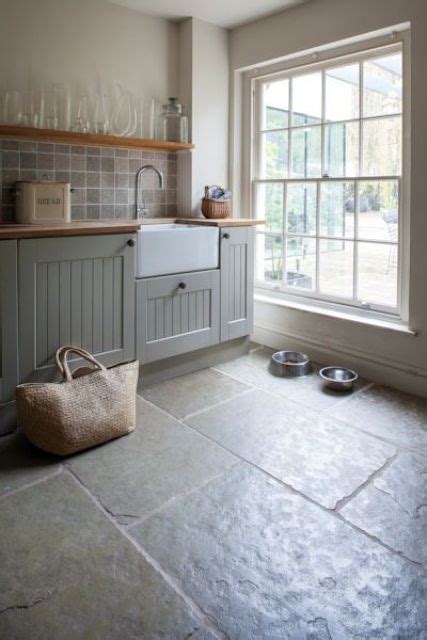 Natural stone is porous and to help prevent it from staining and water damage, this type of kitchen flooring needs to be regularly treated with a sealing agent. 30 Practical And Cool-Looking Kitchen Flooring Ideas - DigsDigs
