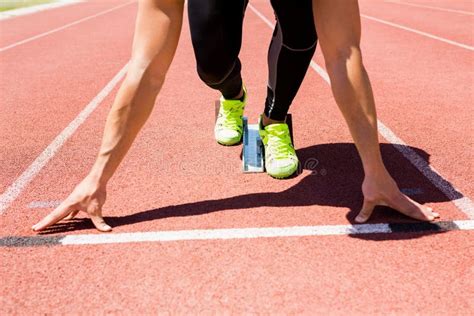 Athlete On A Starting Block About To Run Stock Photo Image Of