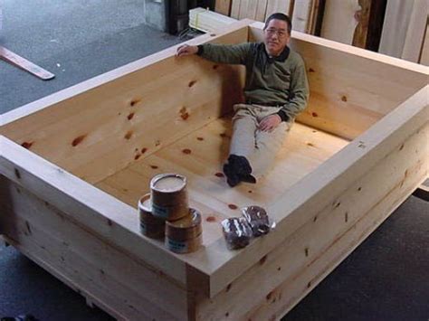 The soaking tub is placed to enjoy a natural view if possible. original hinoki wood japanese bath tubs for soaking and ...