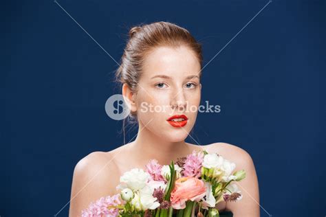 attractive woman holding flowers royalty free stock image storyblocks