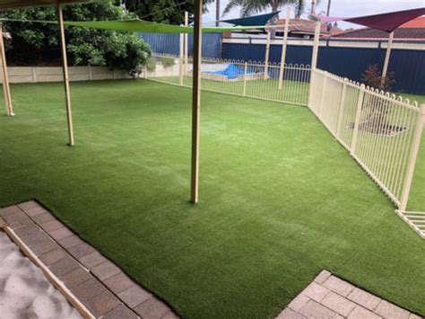 Synthetic Grass And Softfall Rubber For Childcare Centre