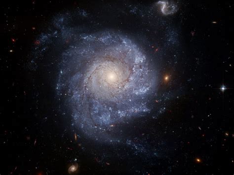 Hubble Snaps Images Of A Pinwheel Shaped Galaxy