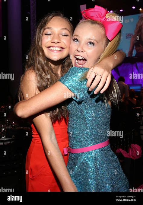 L R Maddie Ziegler And Jojo Siwa Inside At The 2016 Industry Dance