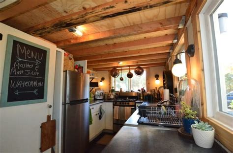 The kitchen includes a gas cooktop with extractor fan, plentiful storage space, and soft close cabinet the tiny house kitchen features butcher block counters, soft close cabinets, a 10 cu.ft. The Cook's Essential Tiny House Kitchen | Tiny House Basics