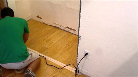 Here you need to follow the marked line to ensure that you are not. DIY: Removing a section of laminate flooring with a multi tool - YouTube