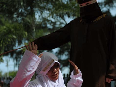 indonesia debuts all women flogging squad to punish sharia violators