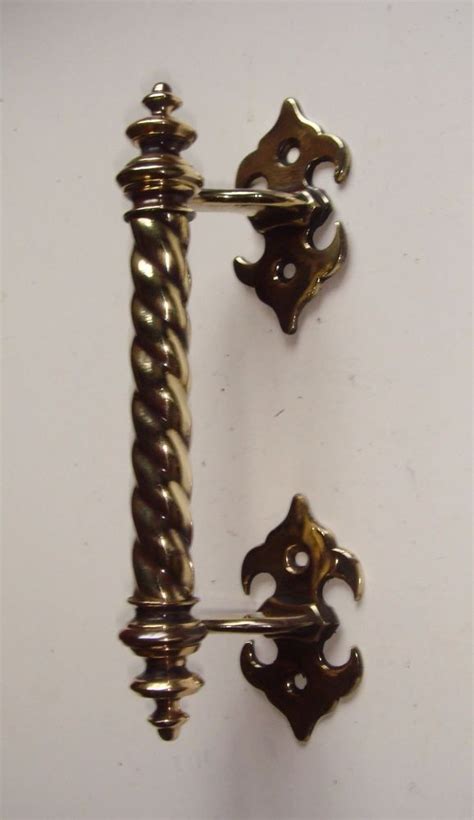 Stylish brass door handle from the beginning of the 20th century. victorian gothic handles - Google Search | Antique door ...