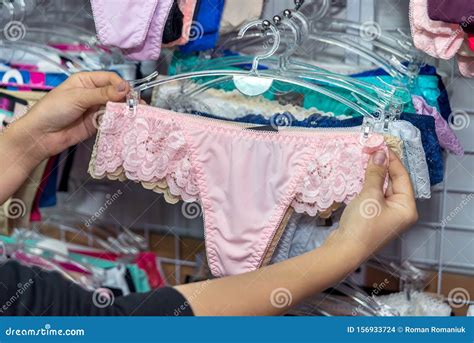 Female Hands With Panties In Underwear Shop Stock Photo Image Of