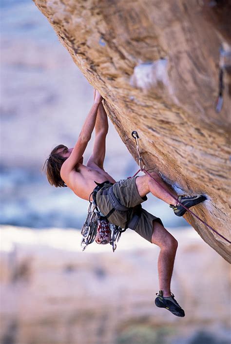 A Male Rock Climber Climbing Photograph By Corey Rich Fine Art America