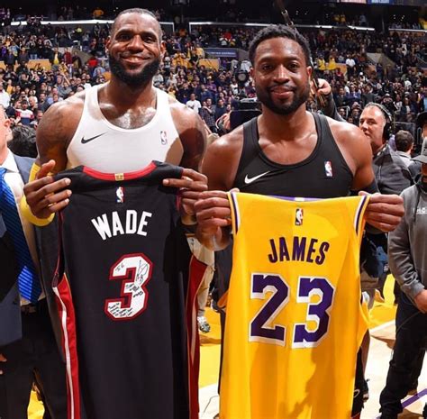 Lebron And Wade Switch Jerseys After There Last Game Against Each Other
