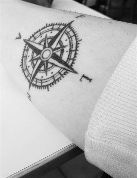 9 hint of blue daisies. Wind Rose Tattoo on Arm | Rose tattoo on arm, Tattoos ...