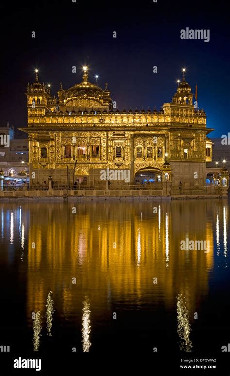 The Golden Temple Reflected In The Sacred Pool Amrit Sarovar