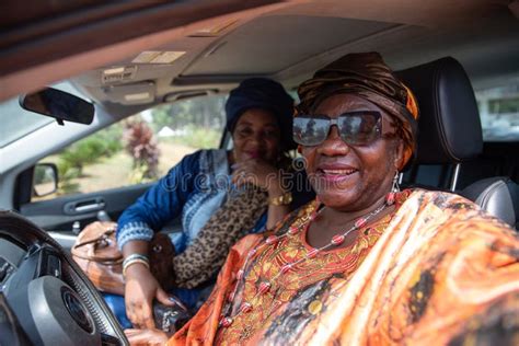 Two African Women In The Car Take A Selfie Friendship Between Women