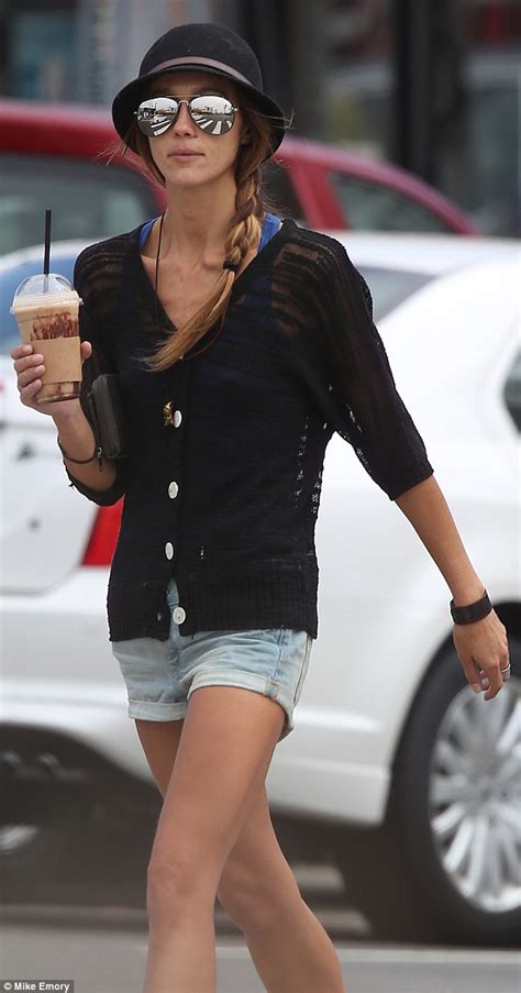 Skinny Sharni Vinson Reveals Her Protruding Collarbone As She Sips On A