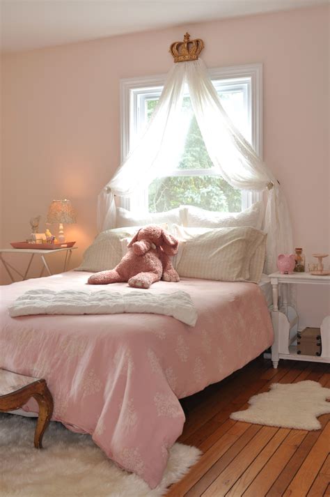 Wall decorations can be simple additions to the appearance of the room such as a hanging pair of ballet slippers or lace around the windows to mimic the appearance of a tutu. princess bedroom little girls room little girls princess ...