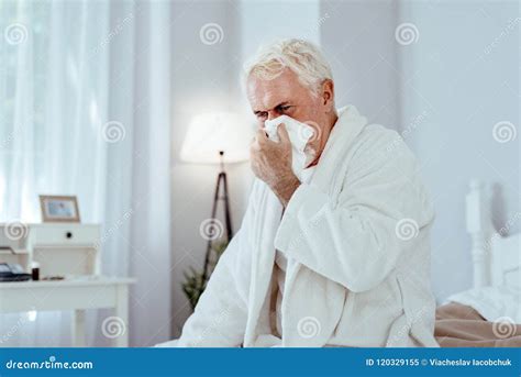Weary Senior Man Sneezing Stock Image Image Of Babyboomer 120329155