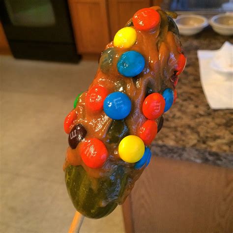 Caramel And Mandms Coated Dill Pickle On A Stick Scary Food Bizarre
