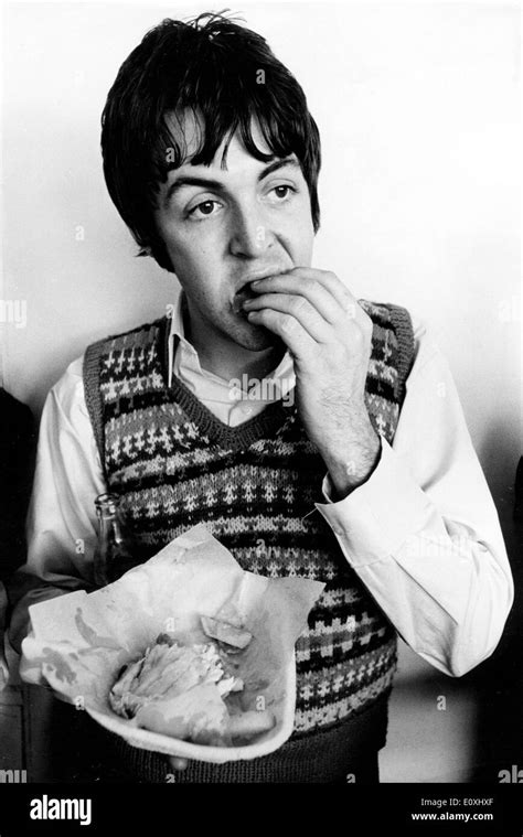 The Beatles Paul Mccartney Eating On A Break While On Tour Stock Photo