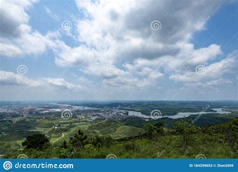 Green Mountains Green Water And Blue Sky And White Clouds In The
