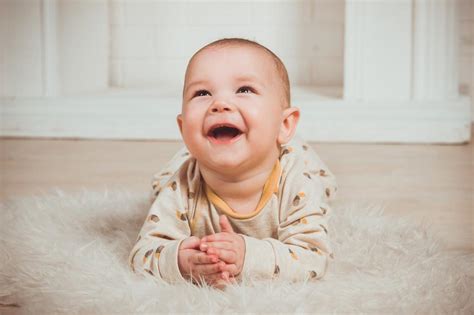 Cute Lying Smiling Baby Free Image Download