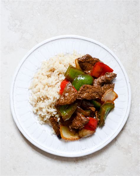 Drizzle the extra stir fry sauce over everything for the ultimate flavor! Chili Garlic Beef Stir Fry with Coconut Jasmine Rice | How Sweet It Is