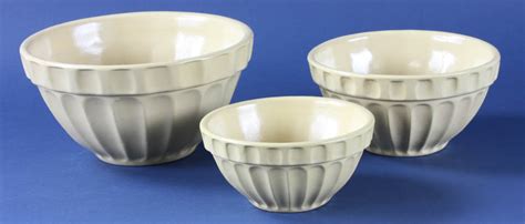 Lot Detail - Group of Three Nested Yellowware Bowls