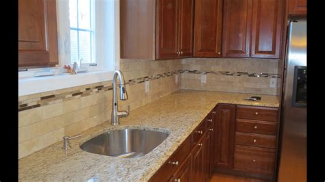 Travertine Subway Tile Kitchen Backsplash With A Mosaic Glass Tile