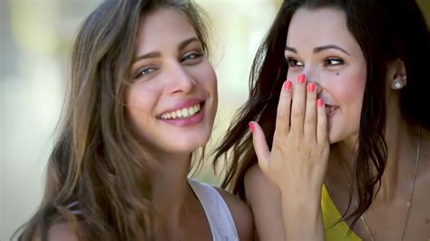 Two Cute Girls Whisper While Shopping 34771578 Stock Video At Vecteezy