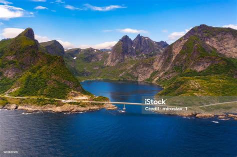 Aerial View Of Djupfjorden Fjord Surrounded By High Mountains In