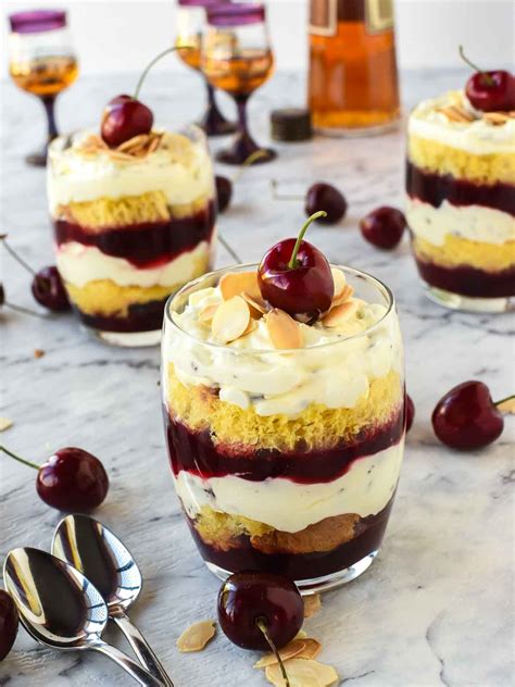 This Is A Trifle Dessert Layered Creamy Cherry Dessert In A Glass With A Cherry On Top