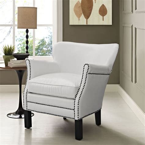 Both armchairs take antique forms, but the former is manufactured wholly out of rubber, while the latter's wooden frame is charred by fire and then painted black to match the upholstery. Key Contemporary White Vinyl Solid Wood Nailhead Cushion ...