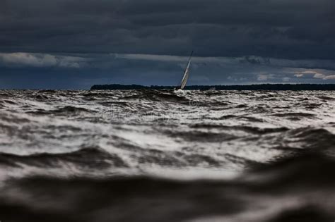 Sailboat In Sea At Stormy Weather Stormy Clouds Sky Orange Sky Sail