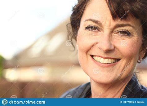 beautiful happy mature caucasian woman outside in the park stock image image of elderly